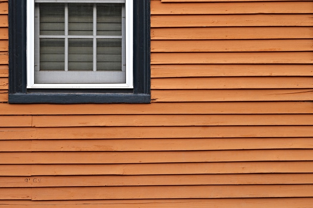 Brick or Vinyl? How to Choose the Right Garage Siding